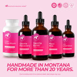 Mountain Meadow Herbs botella 4oz junto a una mano para comparar tamaño