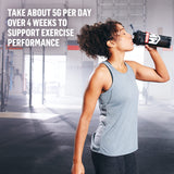 Muscle Milk envase junto a una mano para comparar tamaño y porciones