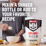 Muscle Milk etiqueta nutricional resaltando 25 g proteína por ración