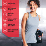Muscle Milk bolsa junto a mano para comparar tamaño y raciones