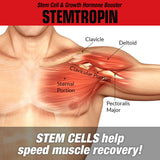 Comparación de tamaño del envase de MuscleMeds STEMTROPIN junto a una mano para escala
