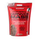 MuscleMeds Carnivor Mass frente del envase mostrando la marca y beneficio de alto aporte calórico