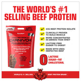 MuscleMeds Carnivor cucharada de polvo resaltando concentración proteica