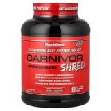 MuscleMeds Carnivor Shred envase frontal mostrando sabor vainilla caramelo y beneficios