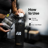 MuscleTech tarro en gimnasio con persona entrenando, uso pensado para rendimiento