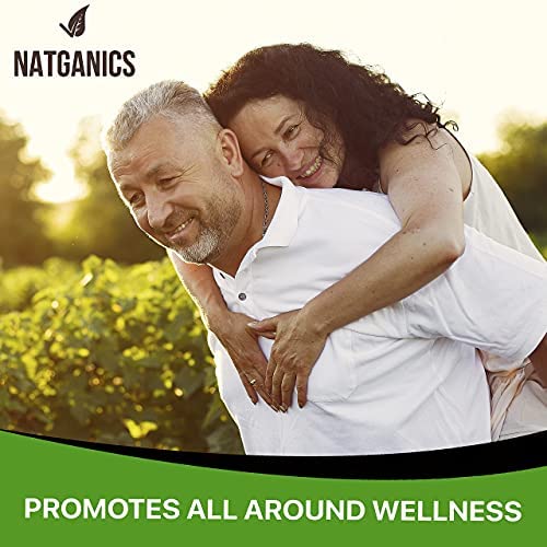 Natganics botella junto a moneda para comparar tamaño y concentración