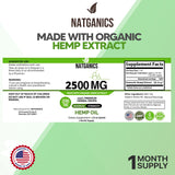 Detalle de gotas y textura del aceite Natganics que evidencia pureza y claridad