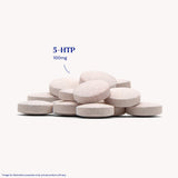 Natrol tableta 5-HTP en boca, rápida disolución y comodidad al tomar