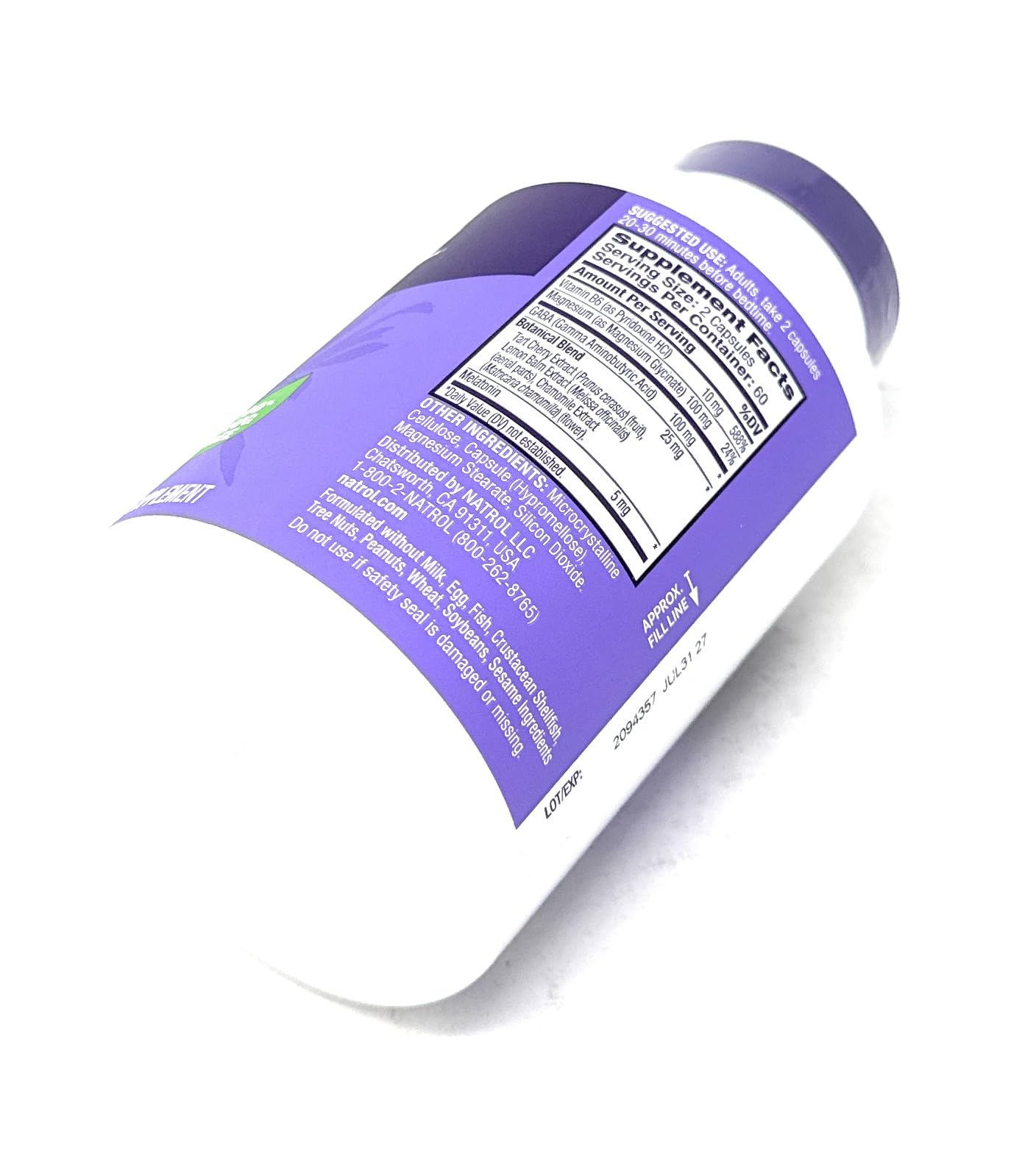 Natrol ingredientes botánicos (cereza, manzanilla) apuntando soporte natural
