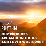 Natural Rhythm botella junto a una regla para comparar tamaño