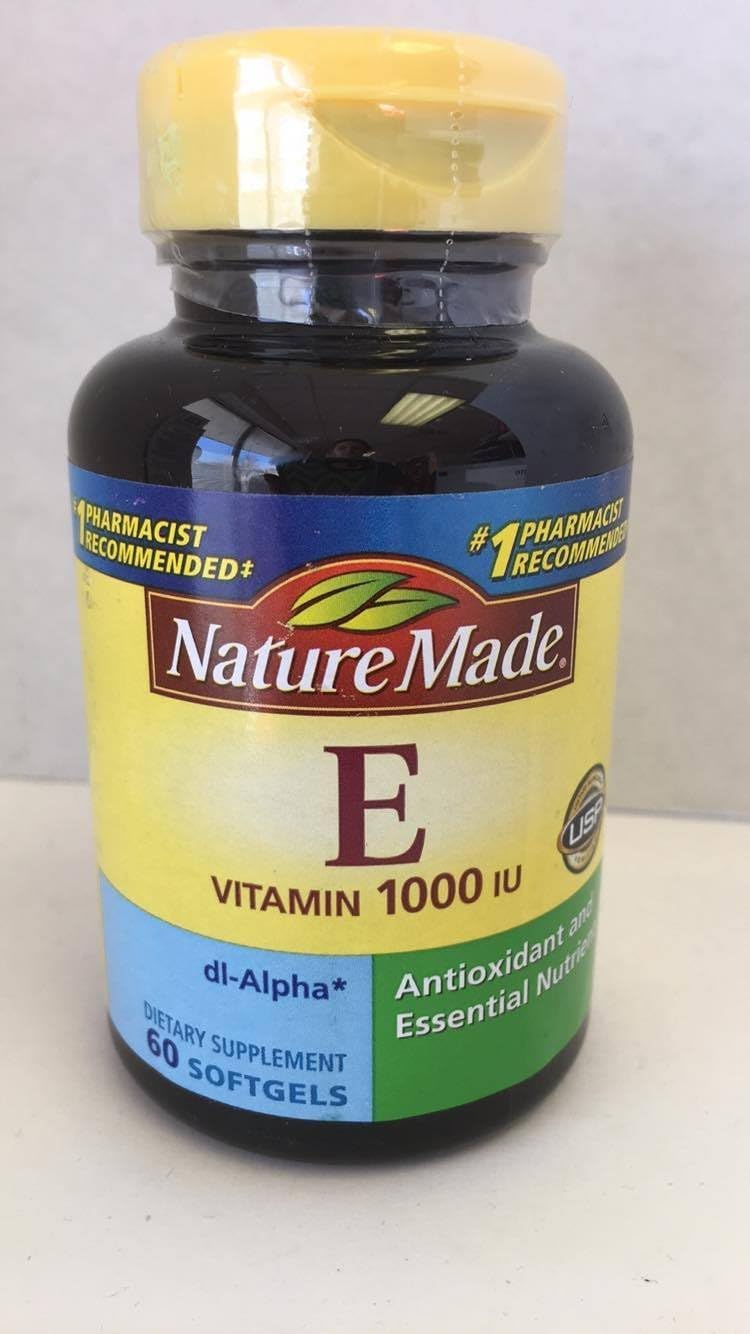 Nature Made frente del envase mostrando 120 softgels y dos botellas, fácil dosificación