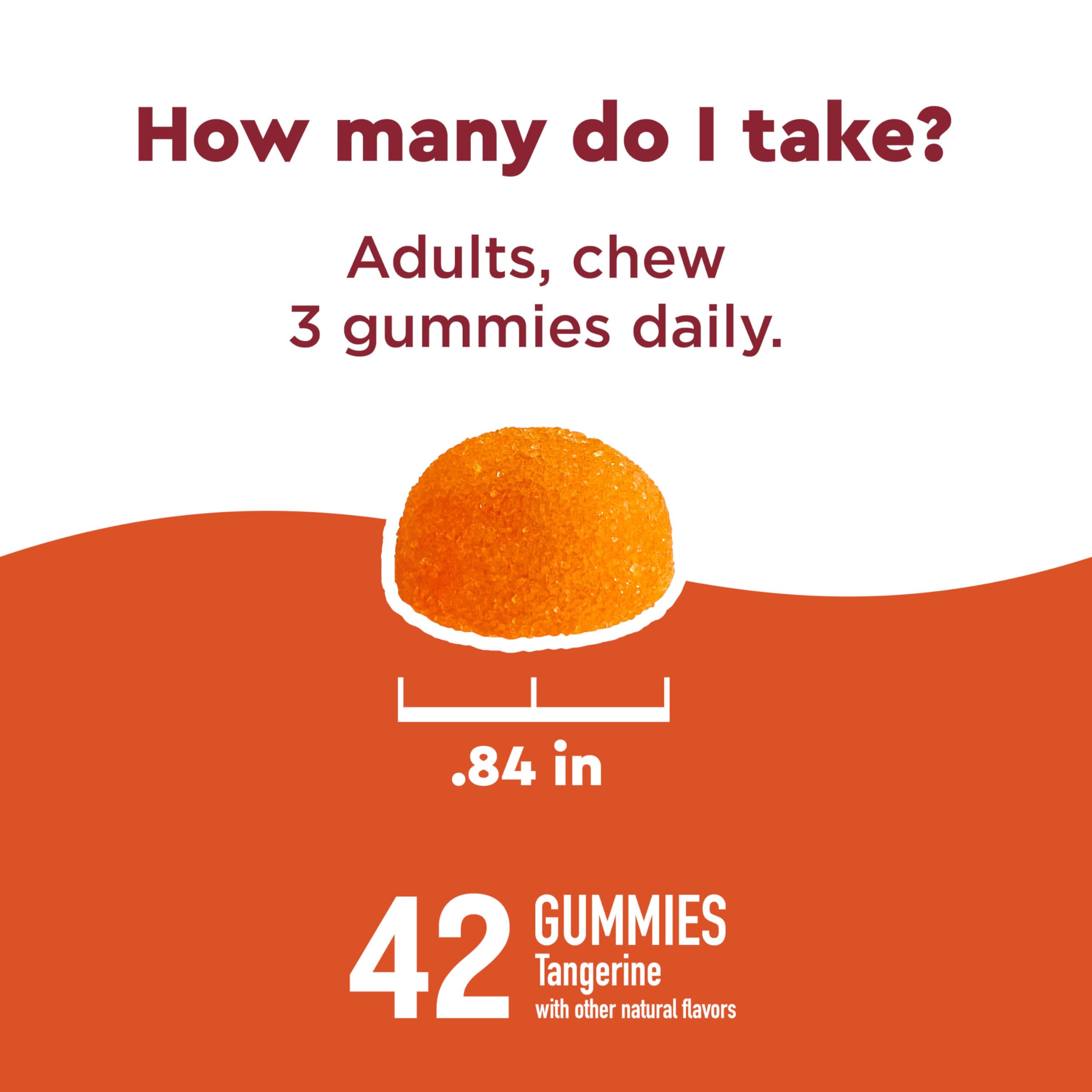 Nature Made gomitas en mano para comparar tamaño y porción