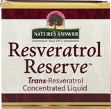 Nature's Answer frasco junto a regla para comparar tamaño portátil