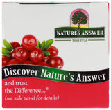 Nature's Answer comparación de tamaño de la botella junto a una mano, dosis portátil