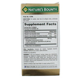 Nature's Bounty cápsula en mano demostrando tamaño y dosificación cómoda