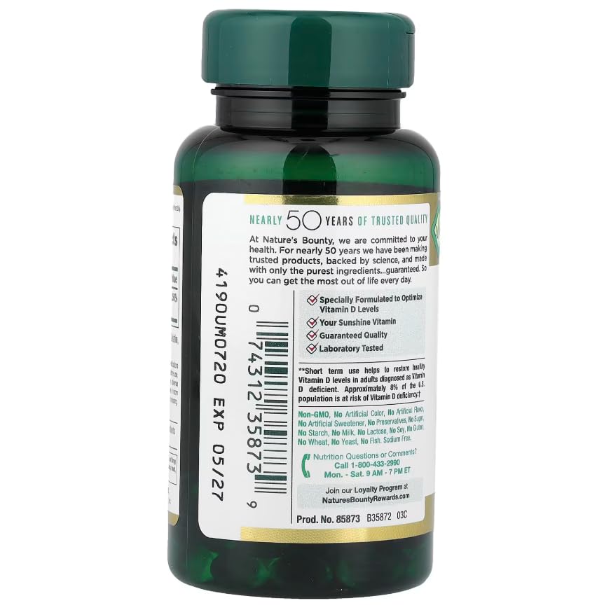Nature's Bounty comparación de tamaño junto a objetos cotidianos para referencia