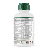 Nature's Nutrition botella cerca de frutas transmite ingredientes naturales
