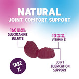Nature's Nutrition comparación de tamaño de gomita junto a moneda
