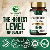 Nature's Peak cápsula junto a una regla para comparación de tamaño real