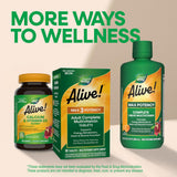 Nature's Way tabletas junto a frutas y vegetales para comparar nutrientes