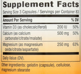 Nature's Way cápsula en mano para comparar tamaño y dosificación