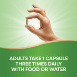 Nature's Way cápsula junto a vaso de agua y plato para uso con comida