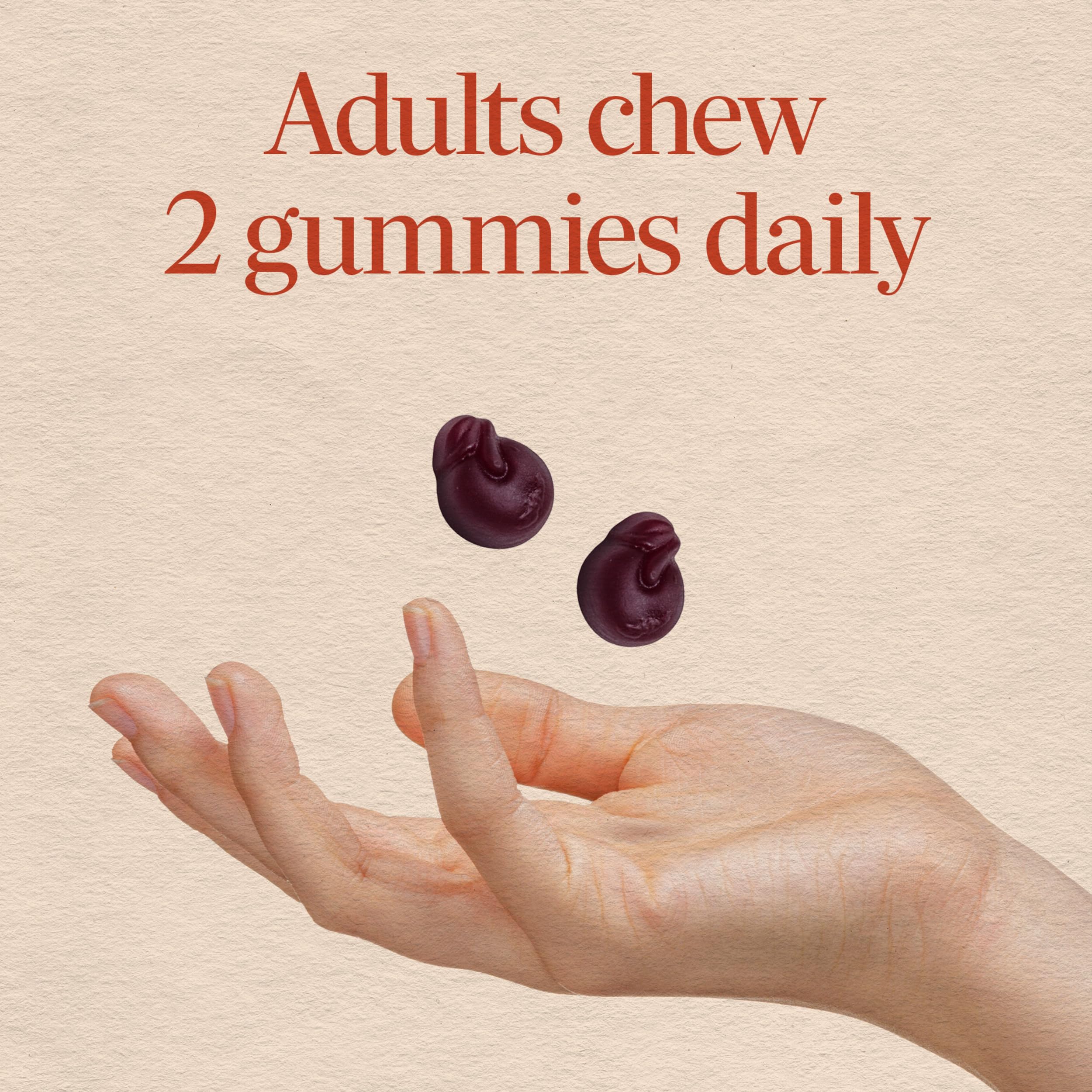 Nature's Way gominola CranRx junto a monedas para comparar tamaño y dosis