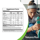 Nature's Plus frasco en mano para comparar tamaño y cantidad de dosis