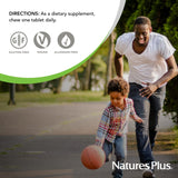 NaturesPlus tabletas junto a naranja para destacar sabor y naturalidad