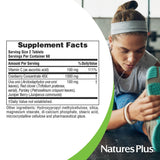 NaturesPlus comprimidos junto a regla para mostrar tamaño real