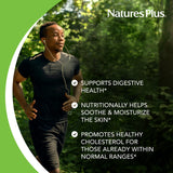 NaturesPlus cápsula sobre mesa de desayuno mostrando integración en rutina diaria