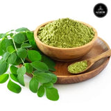 Naturevibe Botanicals cuchara midiendo polvo para recetas precisas