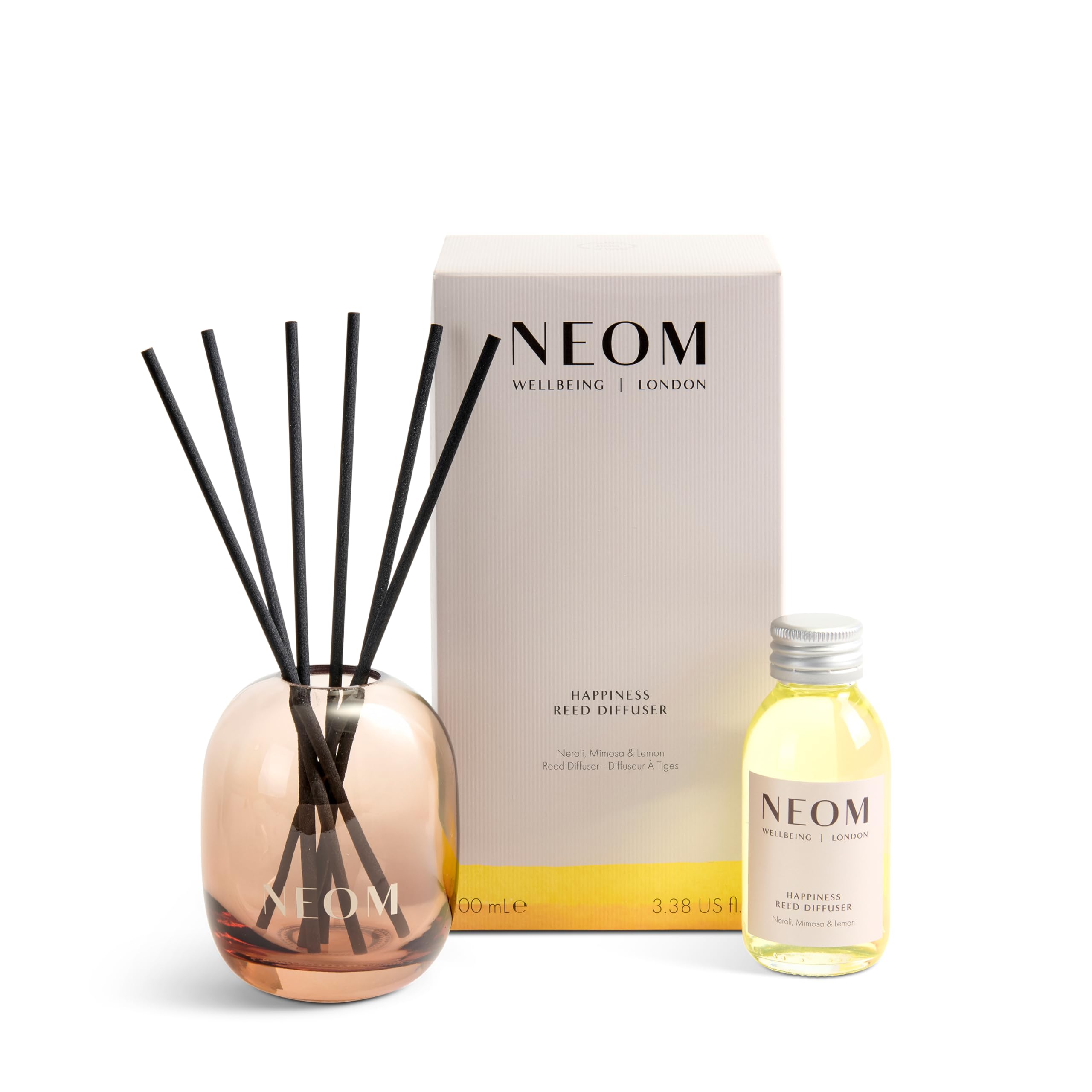 NEOM difusor junto a objeto para comparar tamaño y facilitar ubicación práctica