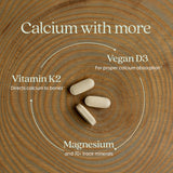 New Chapter montaje con D3, K2 y magnesio destacando su formulación equilibrada
