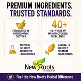 NEW ROOTS HERBAL cápsula junto a moneda para comparar tamaño y facilidad
