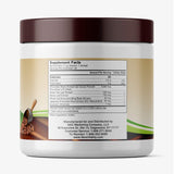 New Vitality Coco Complete envase junto a una mano para comparar tamaño