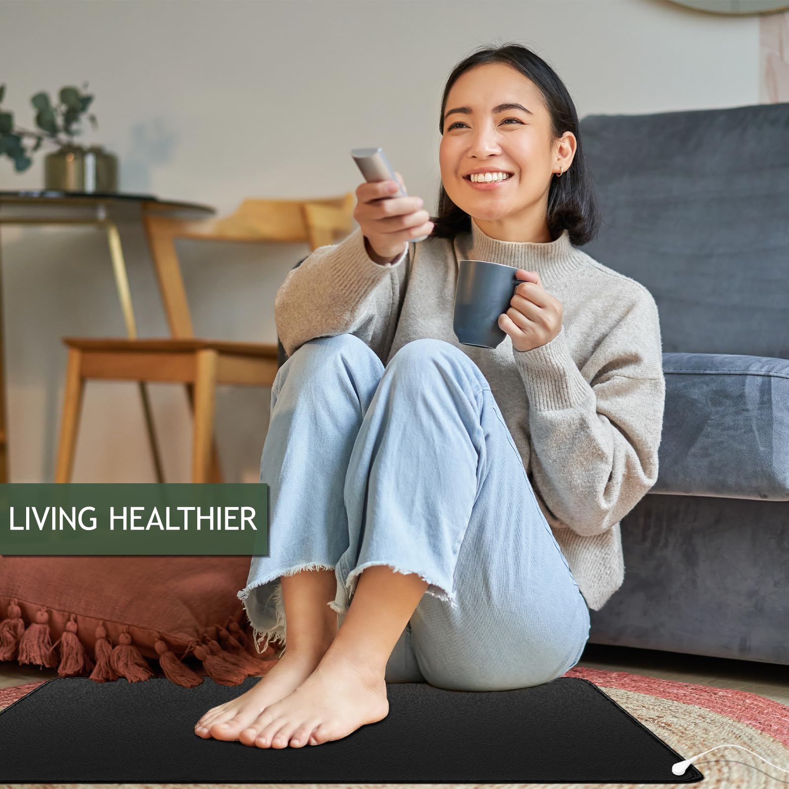 NIULAFR tapete junto a una mano para comparar tamaño y portabilidad
