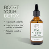 Noelle's Naturals frasco junto a regla para comparar tamaño y capacidad de 2 fl oz