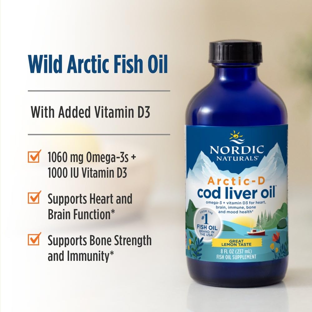 Scoop de Arctic‑D de Nordic Naturals en cuchara para medir una porción precisa y cómoda