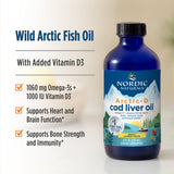 Scoop de Arctic‑D de Nordic Naturals en cuchara para medir una porción precisa y cómoda