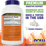 NOW Betaine HCl primer plano de cápsula vegetal mostrando textura y formulación apta vegana