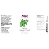 NOW Foods aceite de menta gota en superficie que muestra su textura pura