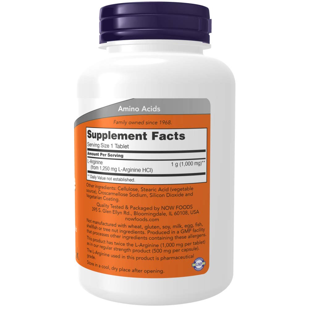 NOW Foods tableta de L-Arginine en primer plano, comprimido claro y uniforme