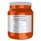Primer plano del polvo NOW Foods L-Glutamine mostrando textura fina y disolución rápida