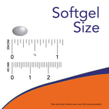 NOW Foods softgel junto a una moneda para comparar tamaño, dosificación conveniente