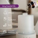 NOW Foods gota de aceite en primer plano mostrando pureza y brillo