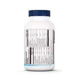 Nutra BioGenesis cápsulas en mano comparando tamaño y facilidad de toma