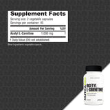 NutraBio ALCAR cápsulas en mano mostrando textura y fácil digestión