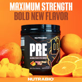 NutraBio polvo textura naranja mango que sugiere mezcla soluble y sabor intenso
