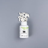 NutraBio TMG en uso junto a equipo de entrenamiento para integración diaria